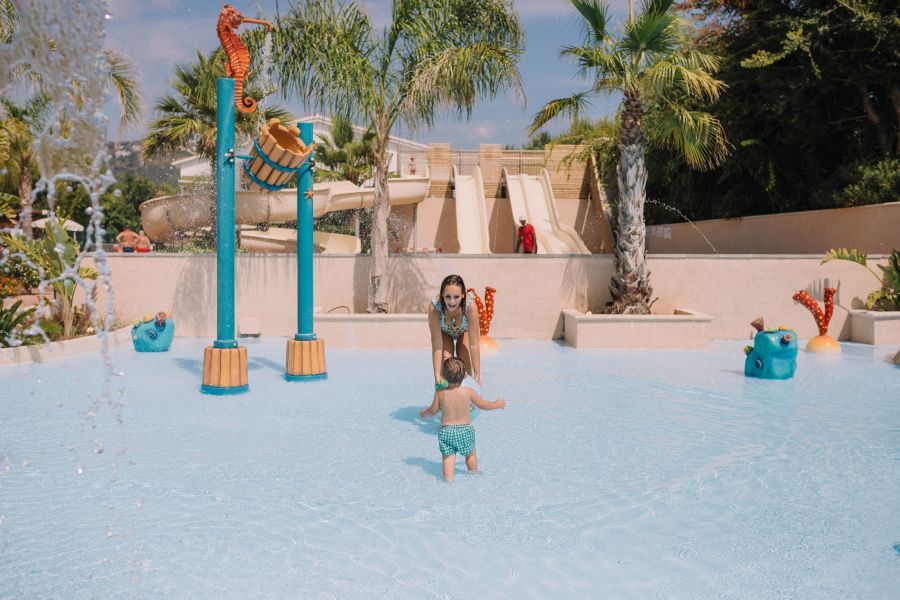 Mother and son in the Children's pool