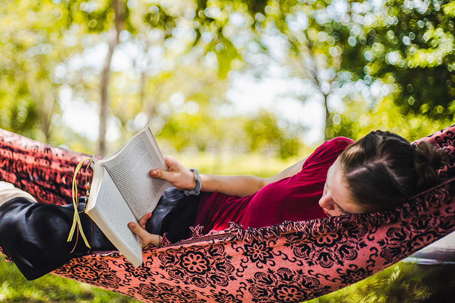 someone reading in nature