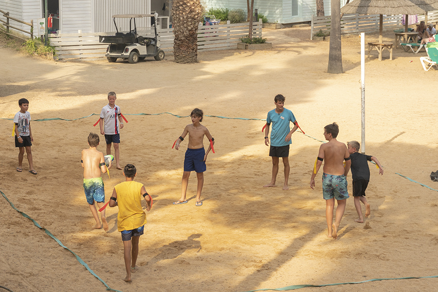 Kids playing rugby at Sènia Campsites