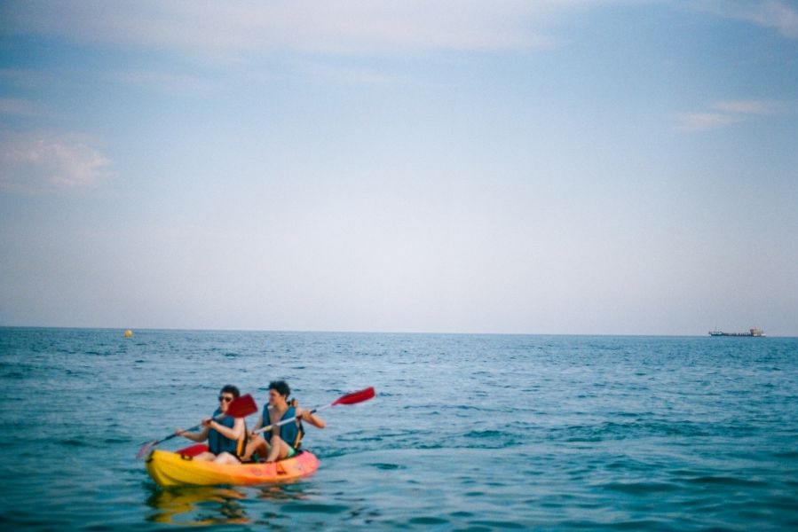 Kayaks for rent in front of the campsite in Pineda de Mar